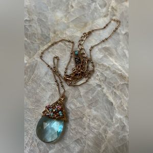 Butterfly and light blue crystal stone necklace. Gold/copper color chain.